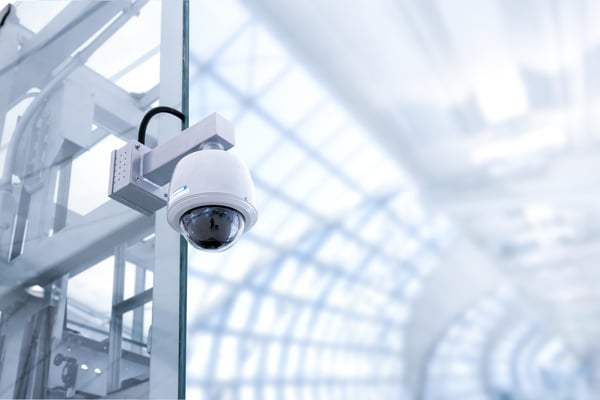 security camera in building light background (1)