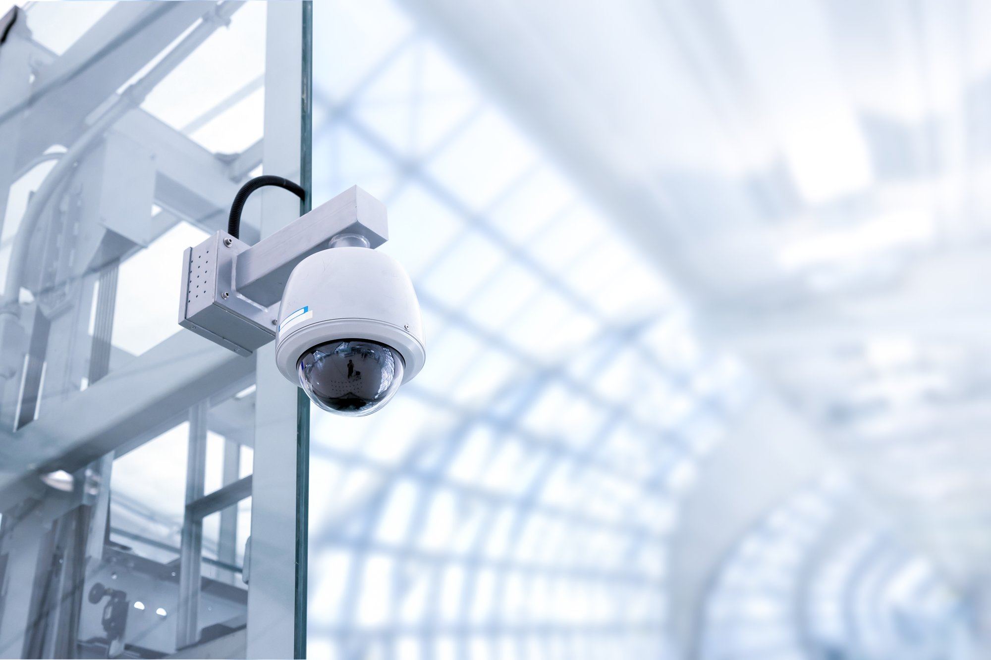 security camera in building light background